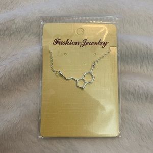 Brand new in package serotonin chemical necklace 18 inches